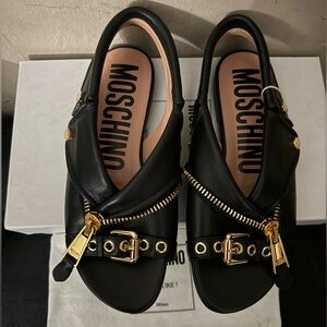 Moschino leather motorcycle jacket sandals